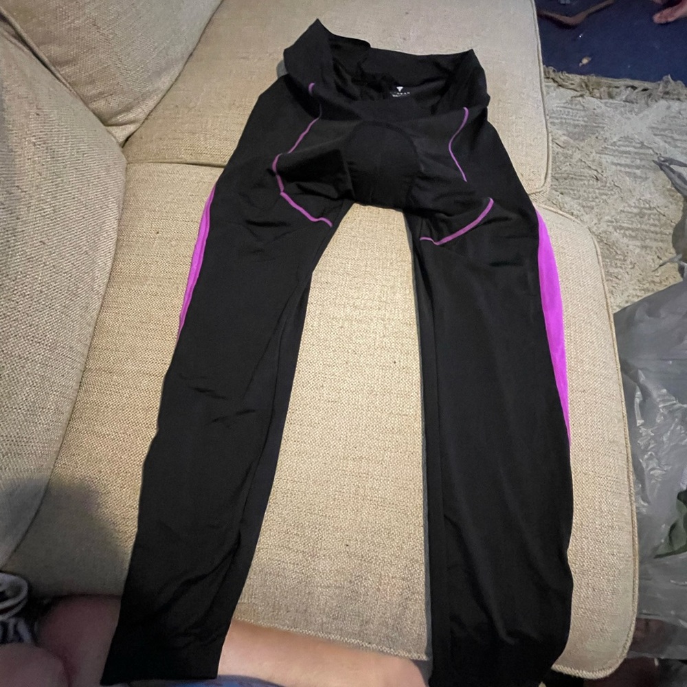 Sleek Black bicycle Leggings with Purple Accents ( padded for bike riding )